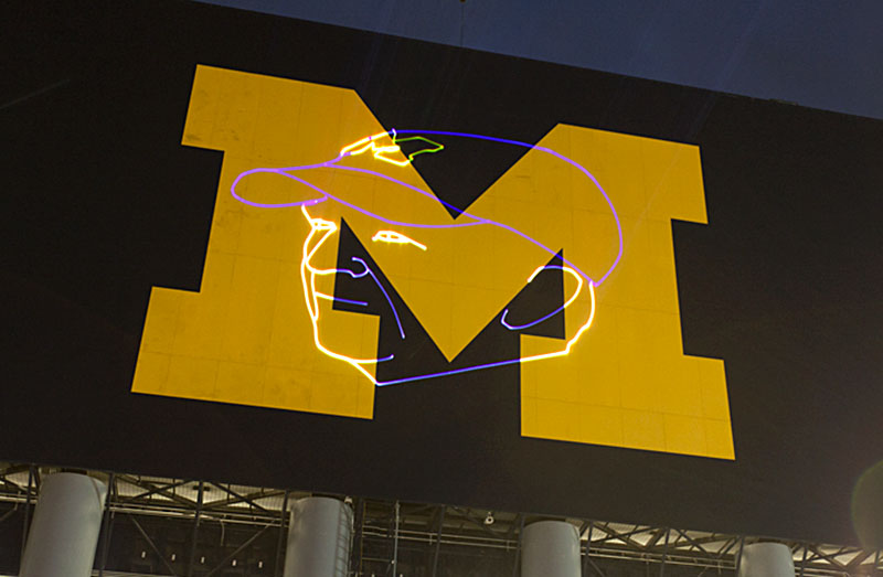 Lloyd Carr laser image on UM Stadium scoreboard