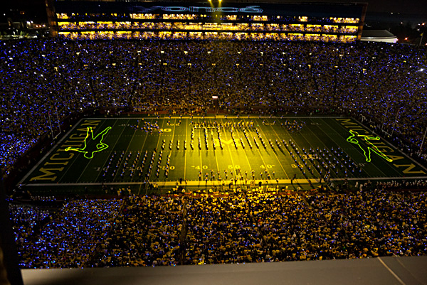 Dancer images on the field of Michigan stadium